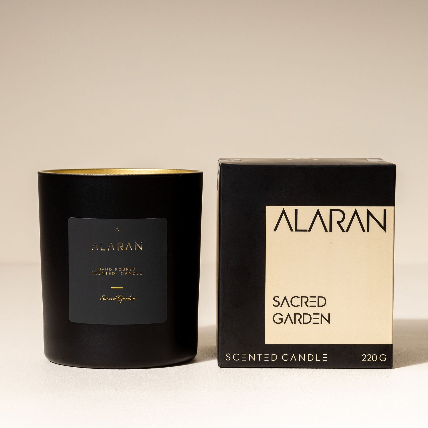 Sacred Garden Candle with packaging on a neutral background