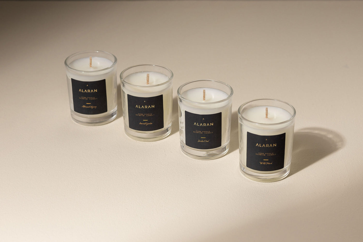 ALARAN Discovery Set candles on a neutral background